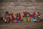 7.28"L Resin Holiday Highland Cow w/ Sign NOEL AND JOY PREORDER ONLY