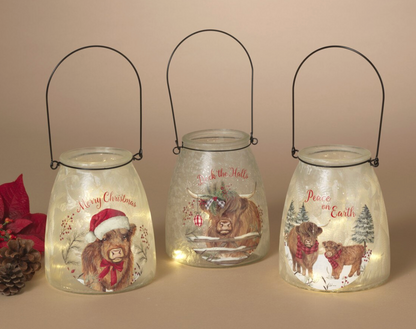 PREORDER ONLY 5.9"H B/O Lighted Frosted Glass Highland Cow Design Luminaries SOLD. INDIVIDUALLY