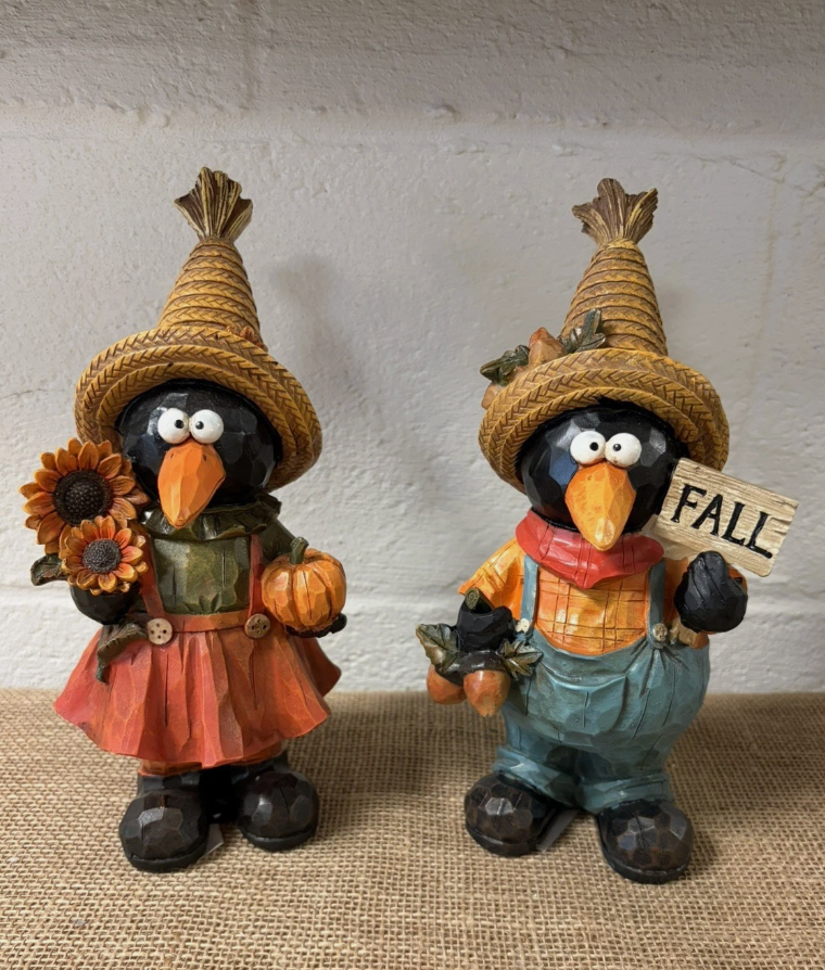 SET OF TWO PRIMITIVE CROWS